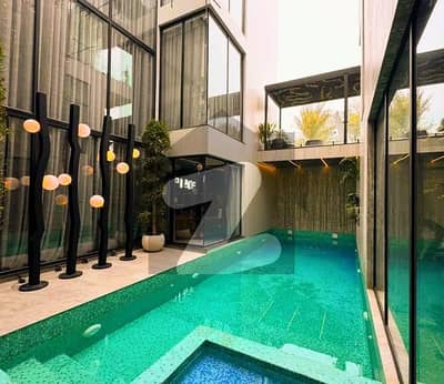 SWIMMING POOL ULTRA-LUXURY MODERN BUNGALOW | 1 KANAL BRAND NEW | DHA PHASE 6 | 25 KW SOLAR | 70 FT ROAD | 100% ORIGINAL DEAL