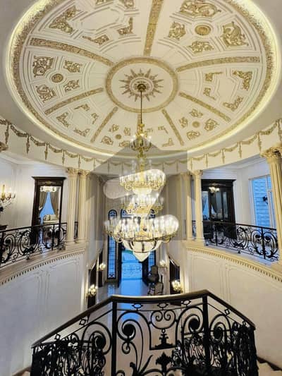 PREMIUM 2 KANAL FAMILY ESTATE WITH POOL IN DHA PHASE 5