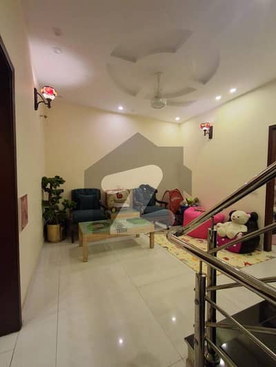 Exquisitely Maintained 5-Marla Slightly Used Bungalow for Sale in DHA 9-Town Block A, Offering the Perfect Balance of Modern Living and Timeless Beauty