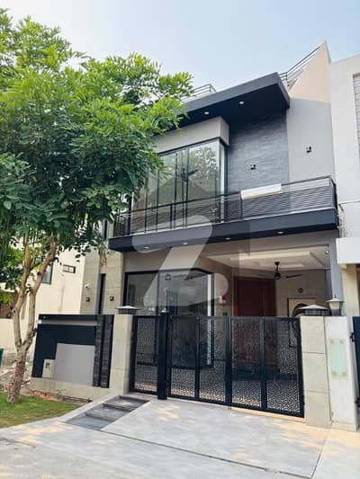 Highly Desirable 5-Marla Modern Design Luxury House for Sale in DHA 9-Town Block B A Statement of Class, Comfort & Quality Living