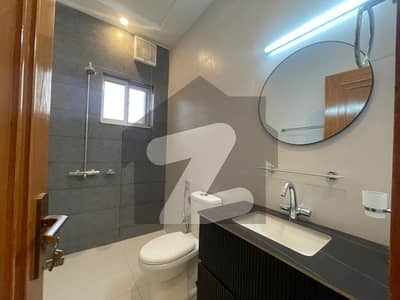 Brand New House for sale in Sector H Back Open to Boulevard Front Open For lawn Best Location For Living Bahria Enclvave Islamabad