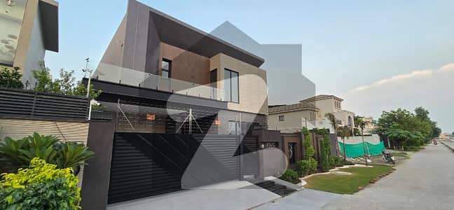 DHA Phase 6 Exclusive: 1-Kanal Modern Luxury Bungalow with 5-Master Bedrooms, 2 TV Lounges, Attached Baths, and Architecturally Stunning Interiors Perfect Blend of Style & Comfort