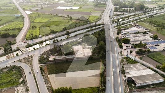 8 Kanal Agriculture Land Front Faisalabad Bypass Near Canal Expressway Jhumra Flyover - 130ft Wide Main Road Front - Best For Investment, Petrol pump, Marquee, Warehouse & Commercial Activity