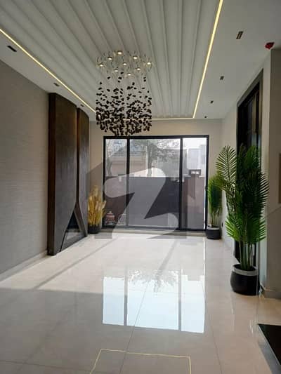 50-Feet Road Prime 5-Marla Stylish Bungalow with Smart Layout, Heart-Capturing Front Elevation, Rooftop, Swimming Pool & 3 Master Bedrooms in DHA 9 Town