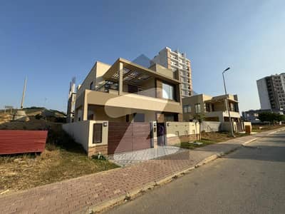 272 Sq Yd Villa For Sale Precinct-6. A+ Construction | 4 or 5 Beds | Drawing, Dining, Lounge, Modern Kitchen & Greasy Kitchen. Just 5 Mins Drive from Main Gate | Near Park, Mosque, Beacon House School, Midway Commercial & Bahria Heights.