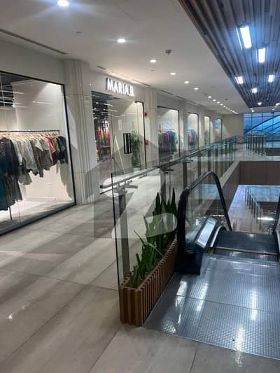 SHOP FOR SALE IN F-8 MARKAZ RUNNING ON RENT