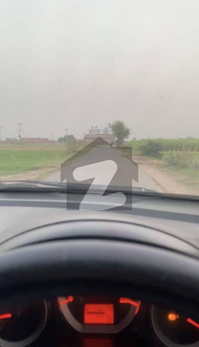 Golden Opportunity for investment in buying 20 acres land with road front at prime location of junction of motorways and highways at heart of central Punjab