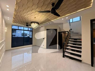 Exclusively Designed 5 Marla Designer House in DHA 9 Town Block D Offering 3 Spacious Bedrooms with Attached Baths and a Perfect Balance of Modern Living & Timeless Beauty