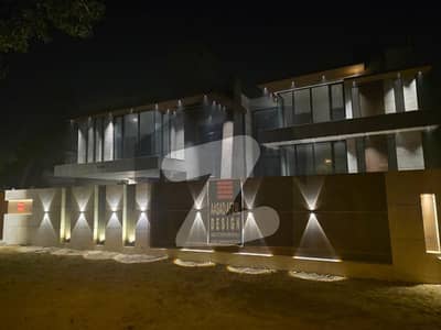 BRAND NEW 2 KANAL ELEGANT BUNGALOW WITH POOL IS AVAILABLE IN THE BEST BLOCK OF DHA LAHORE Made By GD , Finished By ASAD AFZAL