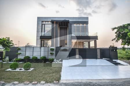 ORIGNAL ADD 1 KANAL BRAND NEW MODREN DESIGNER HOUSE FOR SALE GOOD LOCATION`