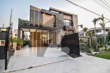 ORIGINAL ADD CORNER FULL BASEMENT WITH CENIMA 21 MARLA ULTRA MODERN HOUSE NEAR GOLDCREST MALL DHA LAHORE