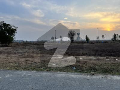 High-ROI Investment Opportunity 1 Kanal Residential Plot for Sale DHA Phase 9 Prism, Q Block | Plot No. 437 Back of Main 150 Feet Road | Near Park | DB Pole Clear | Road-Level Plot Offered by Urban Holdings