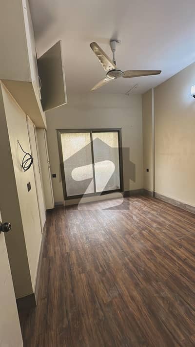 Leased First Floor Road Facing Well Maintained Flat Having 2 Bed Rooms Attached Bath Drawing Lounge &Amp; Kitchen In Very Well Maintained Building Known As Safia Appartments.   Original Pics Attached.