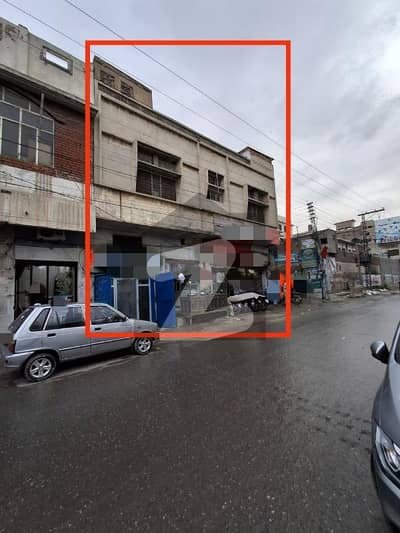 Corner Commercial Building, 4-Shops and 2 House Units with Separate Entrance 5.5 Marla