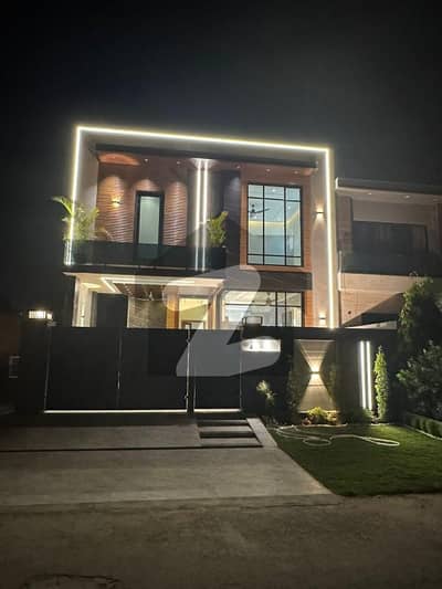 Dream House for Sale: Lake City, Lahore Location: Lake City (Prime Location) Road: 60 Feet Wide Road (Extra space and easy access) Size: 12 Marla Accommodations: 5 Spacious Bedrooms (All with attached baths) Demand: PKR 650 Lac (6.5 Crore) Key Features: Modern Design: Brand new construction with premium finishing and high-quality materials. Ideal Layout: 5 Master bedrooms, double height lobby, and 2 designer kitchens. Prime Setting: Dream House for Sale: Lake City, Lahore Location: Lake City (Prime Location) Road: 60 Feet Wide Road (Extra space and easy access) Size: 12 Marla Accommodations: 5 Spacious Bedrooms (All with attached baths) Demand: PKR 650 Lac (6.5 Crore) Key Features: Modern Design: Brand new construction with premium finishing and high-quality materials. Ideal Layout: 5 Master bedrooms, double height lobby, and 2 designer kitchens. Prime Setting: