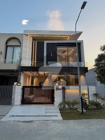 Heart-Touching Location in DHA Phase 9-Town Block C 3 Master Bedrooms with Attached Baths, 2 TV Lounges, Jacuzzi, Dual Kitchens, and Car Parking Easy Deal by Buttar Estate and Groups