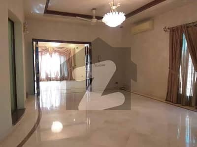 Gulberg Near Zahoor Elahi Roundabout 1 Kanal Double Storey Bungalow For Sale  Having 5 Beds, Lush Green Lawn