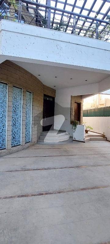 DHA PHASE 4 500 YARDS 6 BEDROOMS SMALL BASEMENT TWO UNIT RENOVATED BUNGALOW IS UP FOR URGENT SALE ON HEIGHTED LOCATION