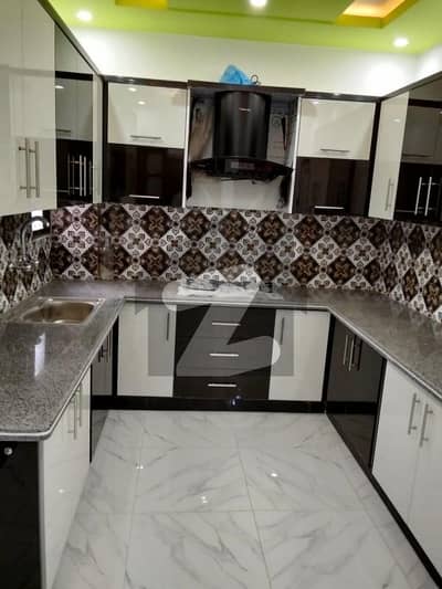 leased newly renovated flat available for sell in Noman plaza Gulshan e iqbal block 11 having 3 bedrooms drawing with total 2 washrooms 1 attached and 1 common with 2 balcony corner flat