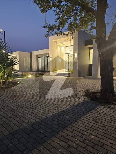 "A Slice Of Paradise: 16-Kanal Swiss Farmhouse With Stunning Views, Large Pool, And Green Lawn On Bedian Road For Sale With Easy Deal Through EMPIRE Estate"