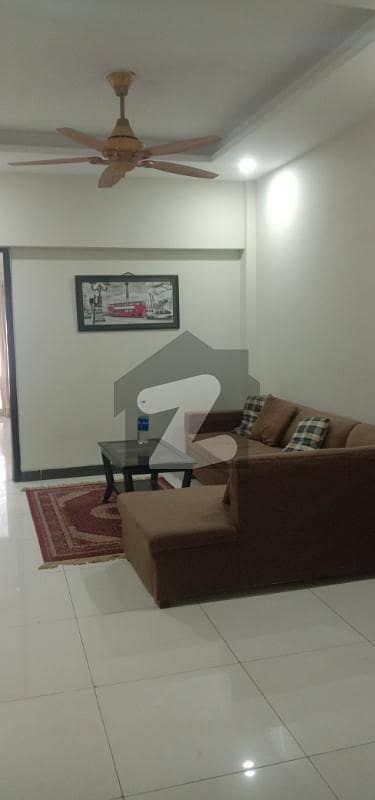A stylish and well-maintained one-bedroom furnished apartment is available for rent in Capital Residencia, E-11, with direct access from Margalla Road.