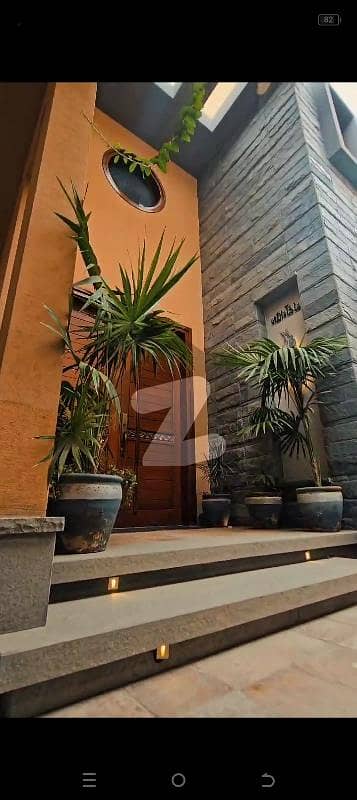 ڈی ایچ اے فیز 6 ڈی ایچ اے ڈیفینس,کراچی میں 6 کمروں کا 1 کنال مکان 21.0 کروڑ میں برائے فروخت۔