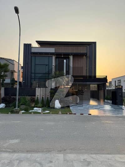 Step into Luxury 1-Kanal Slightly Used Bungalow Featuring Basement, Stylish Interiors, 4-Car Parking, and a Grand Architectural Design in the Heart of DHA Phase 5