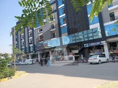 CORNER LOWER GROUND 245 SQFT SHOPE FOR SALE IN MAIN MARKAZ FAISAL TOWN BLOCK A RED SUN PLAZA