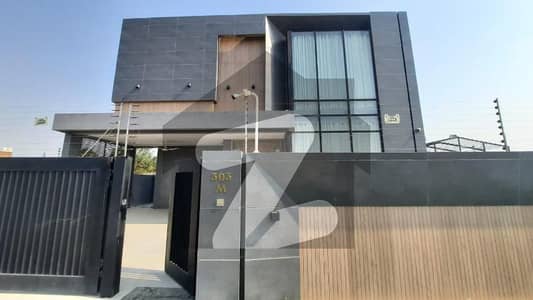 20 MARLA ELEGANT AND FULLY MAINTAINED SUPER HOT LOCATED MAZHAR MUNIR DESIGNED BUNGALOW WITH BASEMENT IS AVAILABLE IN THE BEST BLOCK OF DHA LAHORE.