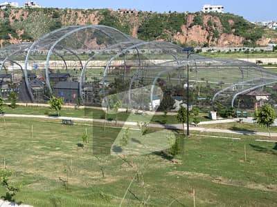 1 kanal prime location plot at main link road infront of masjid