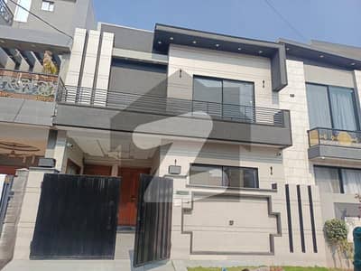 Exclusive 5-Marla Designer House for Sale in Lake City Meadows 3 Beds, 2 Kitchens, 2 TV Lounges & Terrace 240 Lac Negotiable, Contact Buttar Estate and Groups!