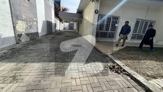 House Available For Rent in F-8  Size 1000 Sqyds  1. Have 8 BedRoom with Attached Washroom, 2. Two Advanced Kitchen, 3. Two T. V Lounges, 4. Drawing Room, 5. Dining Room, 6. Swimming Pool  7. Beautiful Lawn, 8. lift 9. Terrace, 10. Servent Rooms, 11. Multi