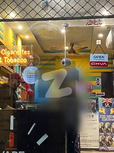 300 Sqft Corner Main Front Shop With Direct Meeting For Sale in Johar town phase 2 Near Emporium Mall.