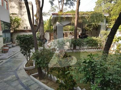 Two Kanal Ideal Owner Build House in NFc In D Block on 80 Fit Road Tile Floor with 10 KVA solar system