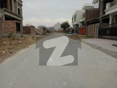 Residential Plot Surrounded By Houses In E-18 Health Enclave Islamabad
