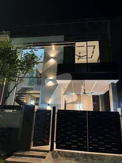 5 Marla Brand New Modern Design Lavish House For Sale In DHA | For Discounted Price And Original Pictures Download The App "Signature Lands".