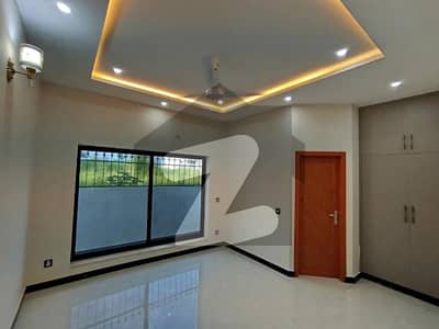 1 Kanal Brand New House 7 Bedrooms With Drawing Room With Servant Room/ Bathrooms9 With Besetment /4 Car Parking Gadget Community