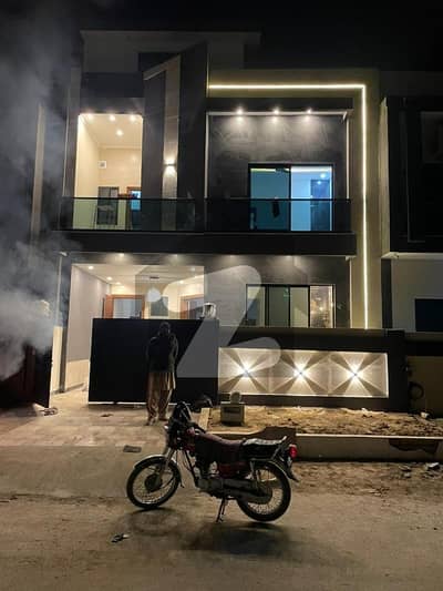 5 Marla Double Unit House Available For sale in Multi Gardens MPCHS B-17 Fasail margalla city Islamabad.