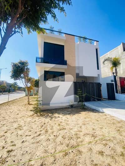 5 Marla ( 25*50 in Block F ) Corner Brand New House Multi Gardens MPCHS B-17 Islamabad.