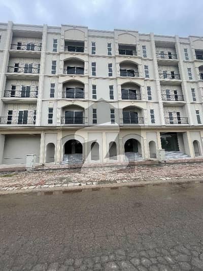 Shop available for sale in Bahria Enclave Sector A already rented monthly income 35000