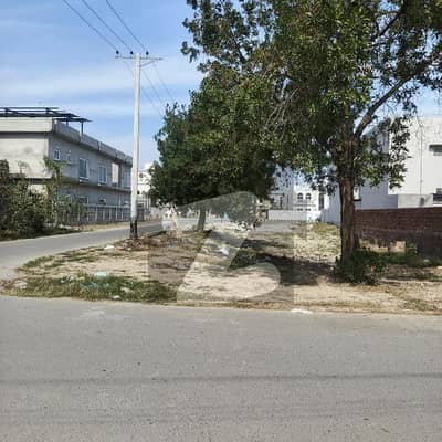 10 marla corner plot back off 100 fit road on prime location in L block