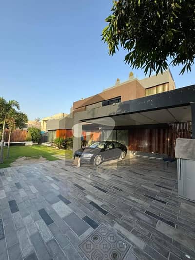2 Kanal Slightly Used Luxury Ultra-Modern Design Most Beautiful Bungalow For Sale at Prime Location of DHA Lahore Near To Park Masjid & Commercial Market .