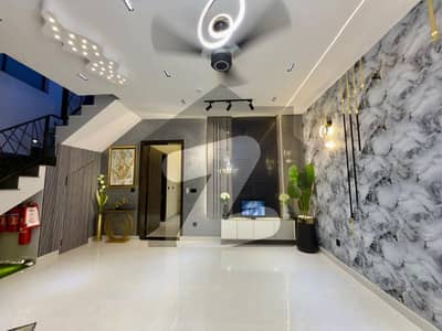 Stunning 5-Marla Designer Residence Offering Proper Ventilation & Stylish Living in DHA Phase 9-Town 3 Master Beds, Dual Kitchens, Prime Access Demand 262-Lac Motivated Seller Buttar Estate & Groups