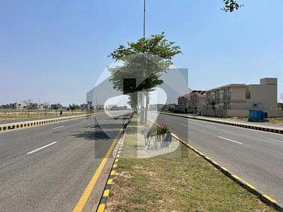 Booming 1-Kanal Plot in DHA Phase 7 Block R | Direct Approach to Raya in 1-Minute | 70 Ft Road, 2-Sides Covered | Prime Location Near Mosque & Park | Secure, Hassle-Free Deal at 555 Lac | Motivated Seller Buttar Estate and Groups