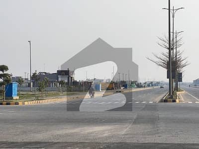 Back to 150 Ft Road, Near Raya, Surrounding Houses 1-Kanal Plot in DHA Phase 7 Block W | Safe & Peaceful Community | Next-Big-Thing Location | Hassle-Free Deal by Buttar Estate & Groups