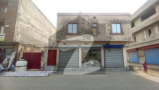 1 Kanal 3 Side Road Commercial Plot With Three Shops And Apartment Already Rented