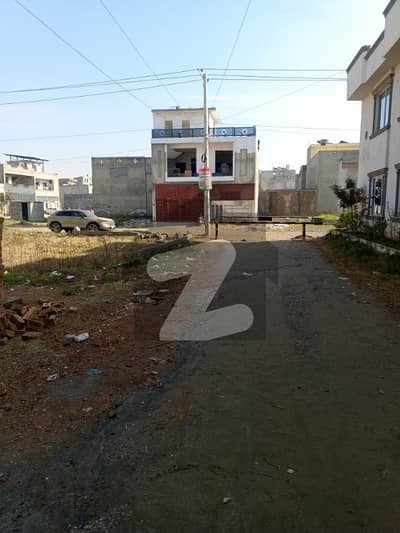 Corner Plot 10 Marla Size. (35+70) 40 foot Gali hy Demand 99 lack final 95 lack Tahir Khan 03115850472