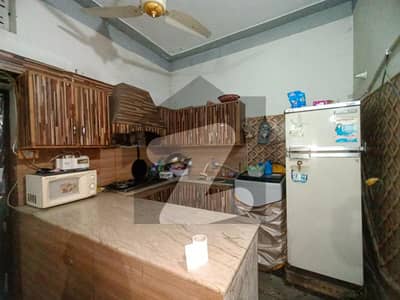 5 Marla Triple Storey Semi Commercial Facing Park House with 2 Shops on 40 Feet Road