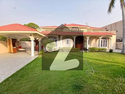 2 KANAL ORIGINAL FAISAL RASOOL SPANISH DESIGN BANGALOW WITH BEAUTIFUL LAWN FOR SALE NEAR TO PARK.