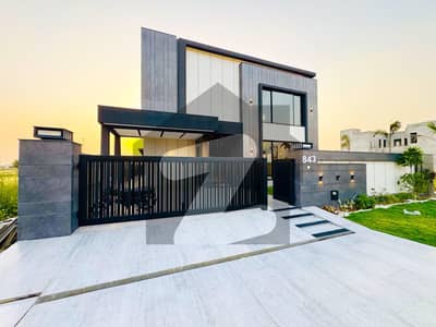 A 1 kanal house in Phase 8 of Defence Housing Authority near park, mosque, and market